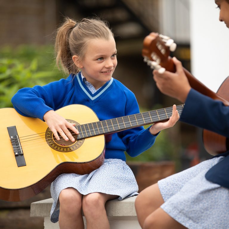 children playing guitar