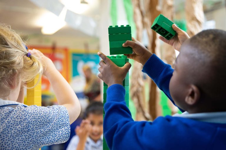 child playing with lego