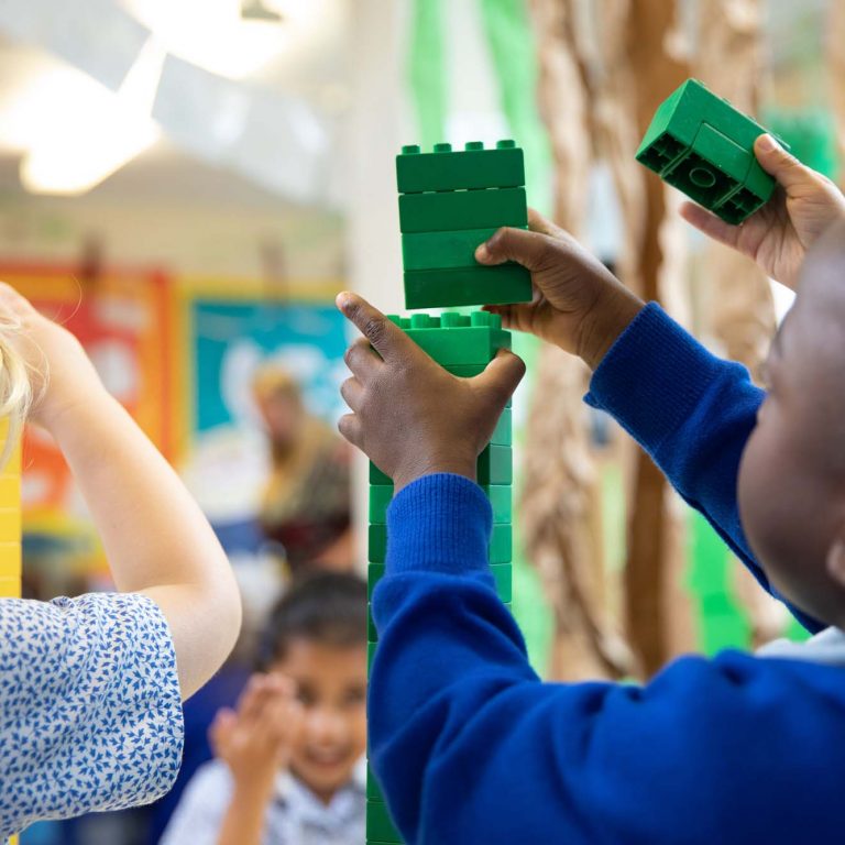 child playing with lego