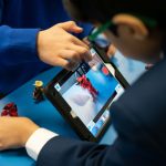 children playing on a tablet