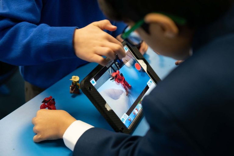 children playing on a tablet