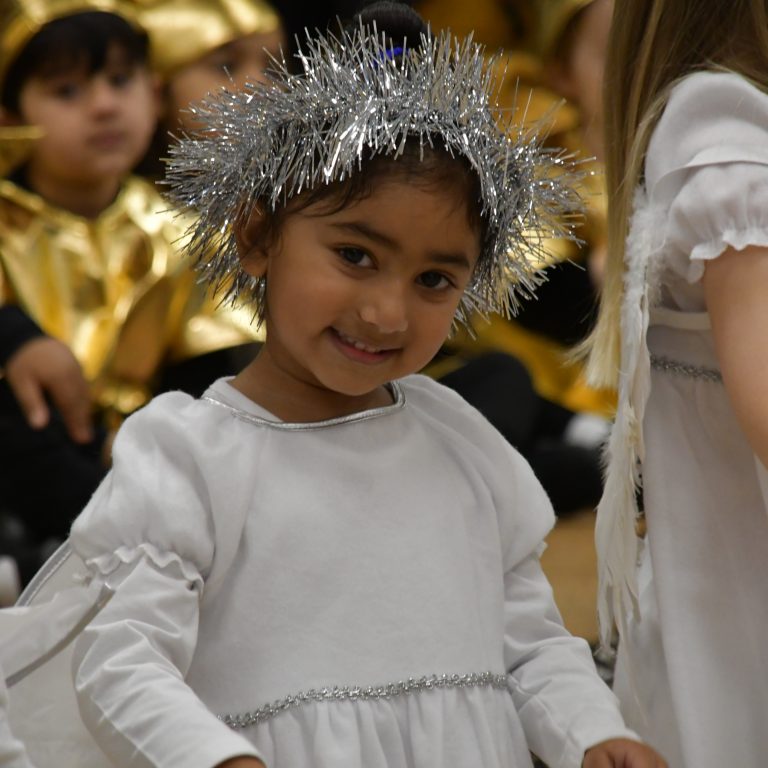 Child in angel outfit