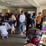 Avon House Bake Sale with parents and younger children