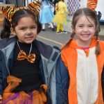 2 girls wearing tiger costumers at the World Book Day event