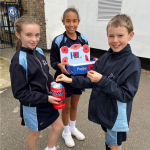 children outside selling poppies