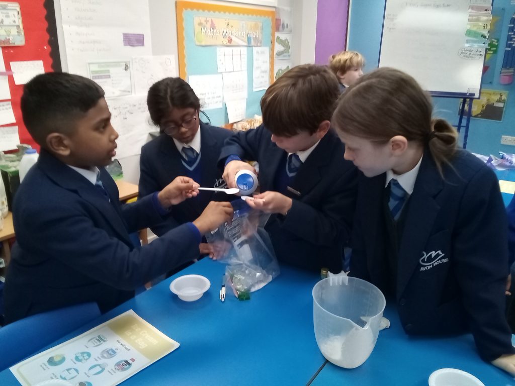 students doing a science experiment