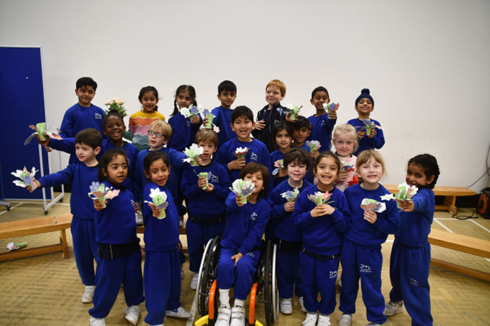 groups of students with their paper-made flowers