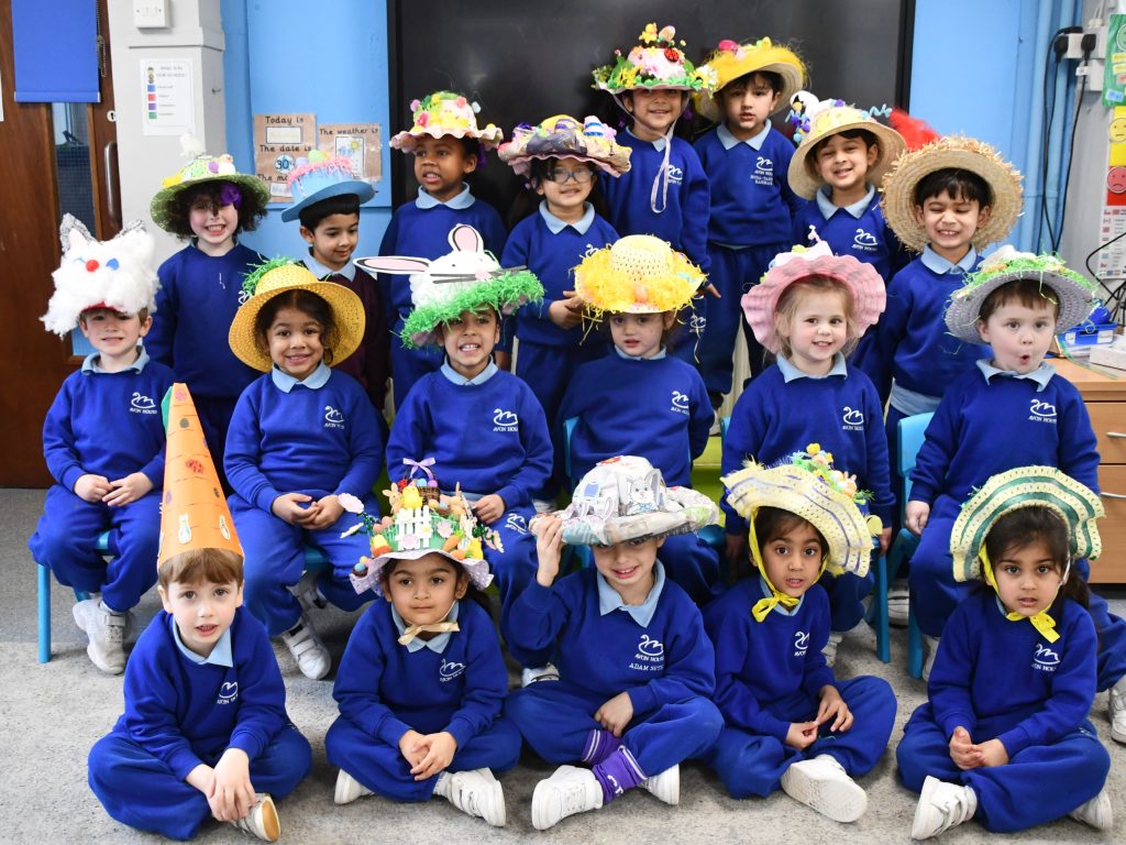 students in class wearing easter hats