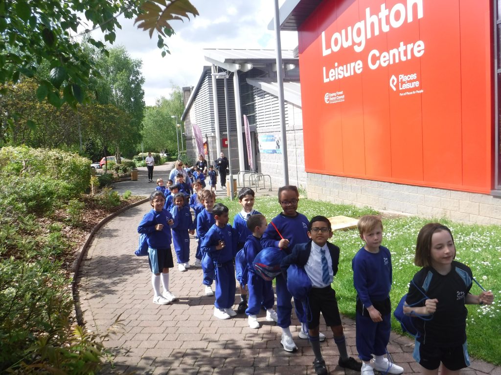 students walking down a path