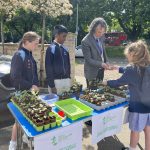 Students selling plants