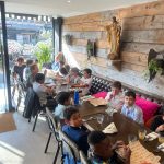 Students eating in a restaurant