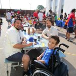 Parents and students eating at a table