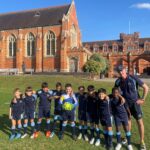 football team and coach
