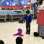 student playing with a toy