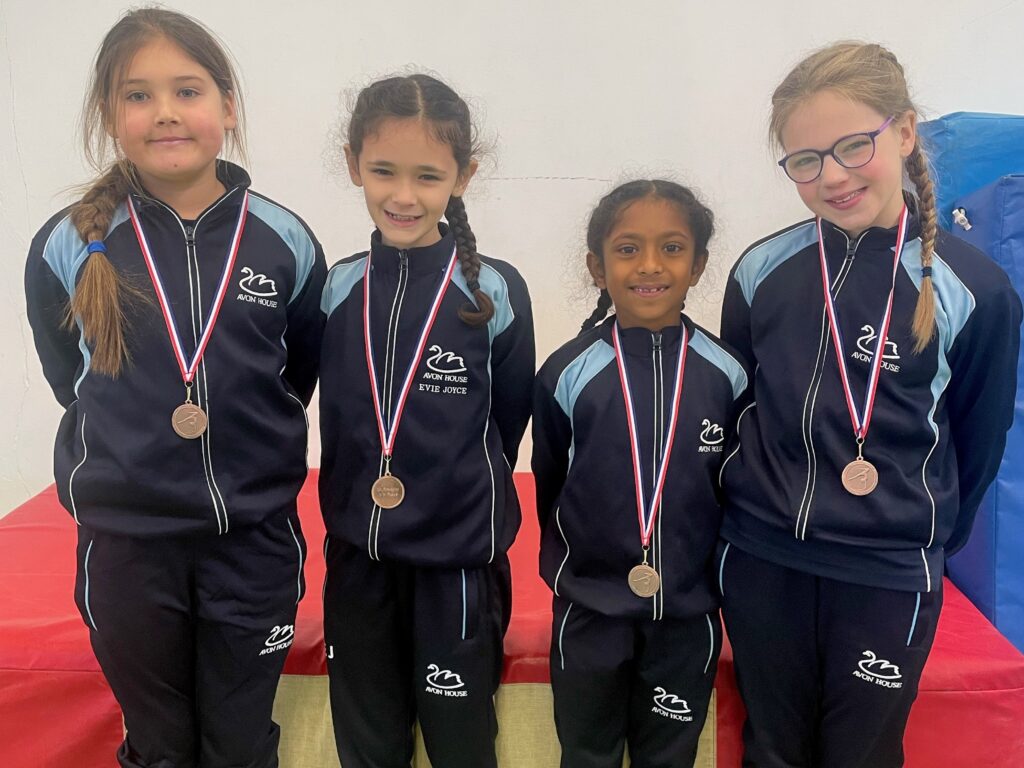 students wearing medals