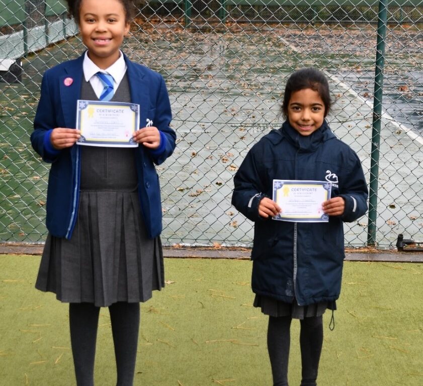 Students holding their awards