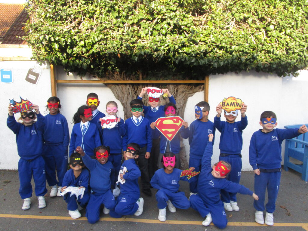 students wearing superhero masks