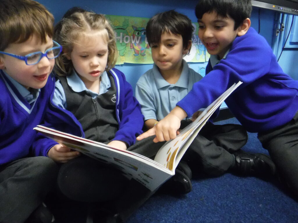 students reading a book