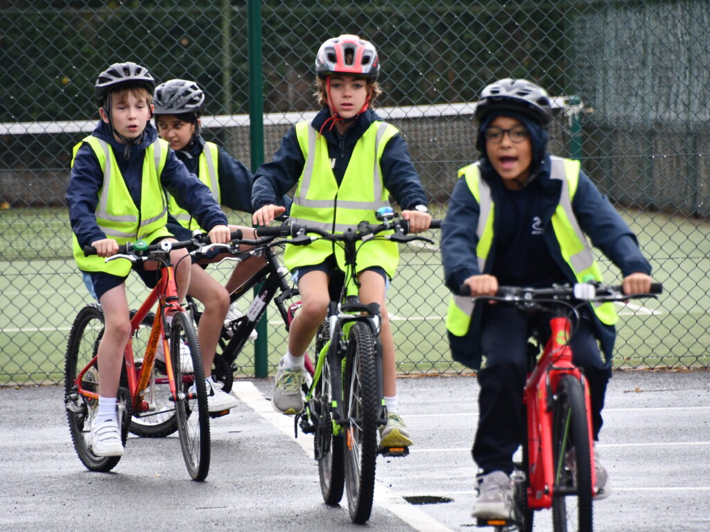 students riding bikes