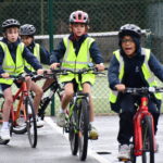 students riding bikes