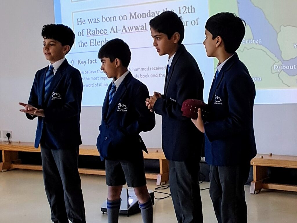students doing a presentation on Prophet Muhammad