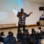 students in class assembly
