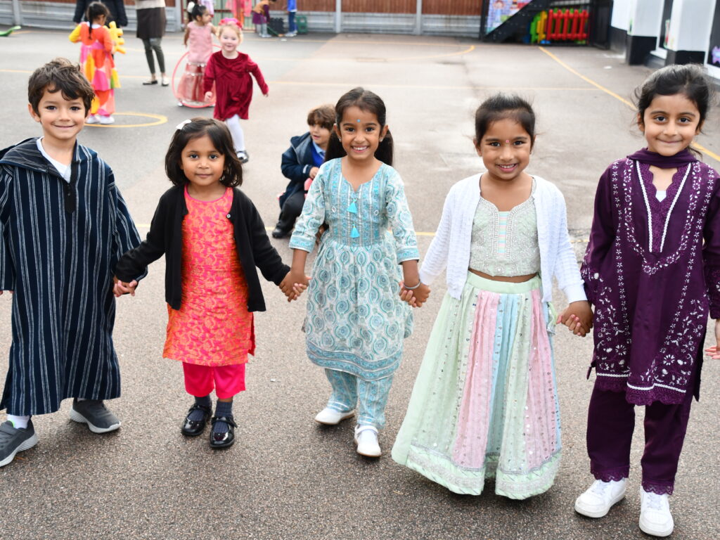 students in traditional clothing