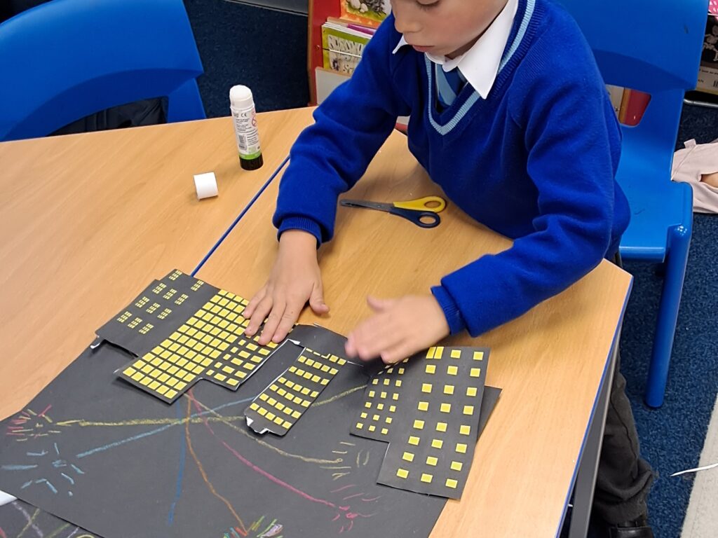 student creating art