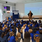 students in an assembly